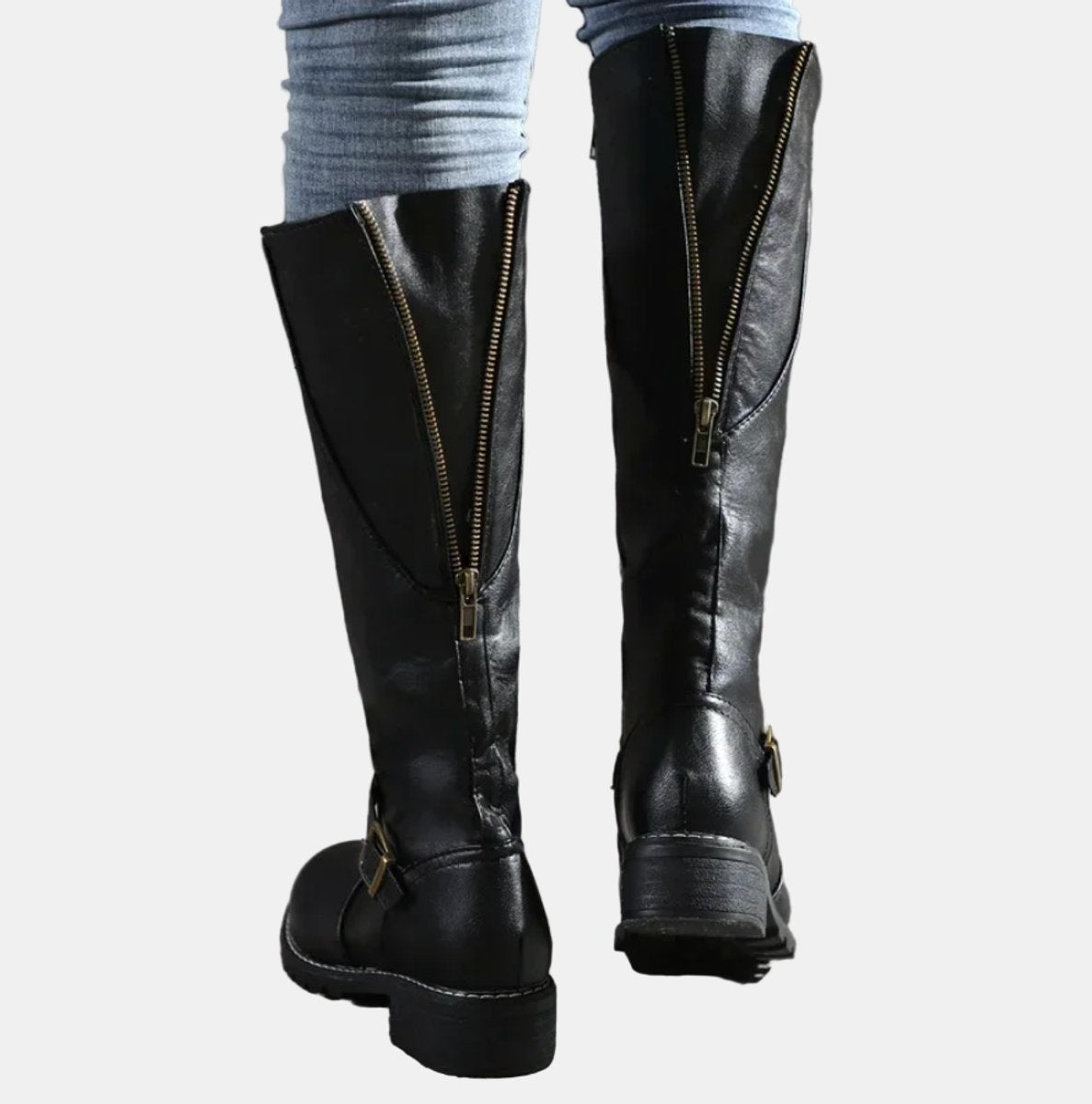 Women's knee high riding boots with ankle buckle strap and low heel