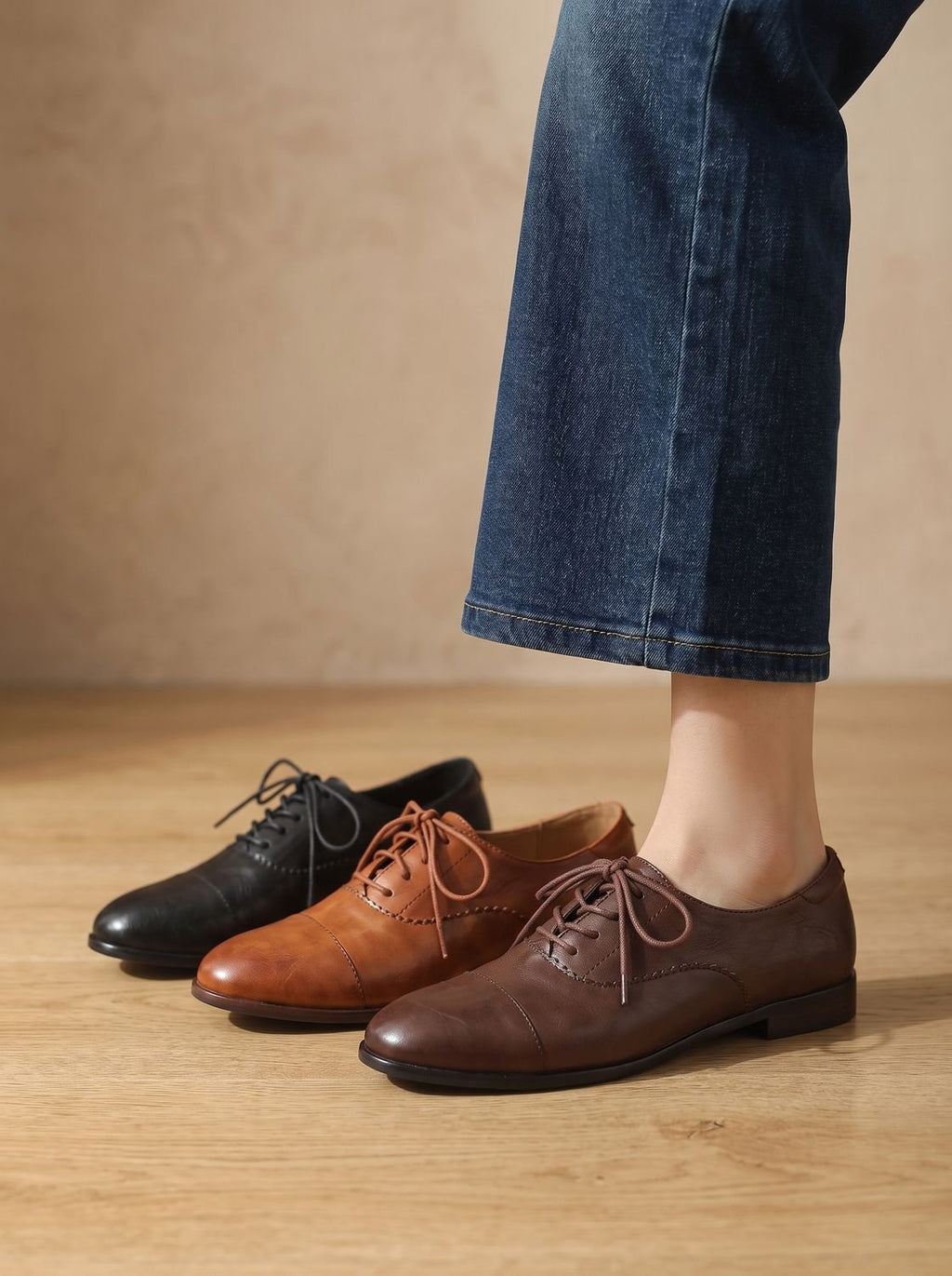 Women's brown cap toe lace-up Oxford shoes with low heels