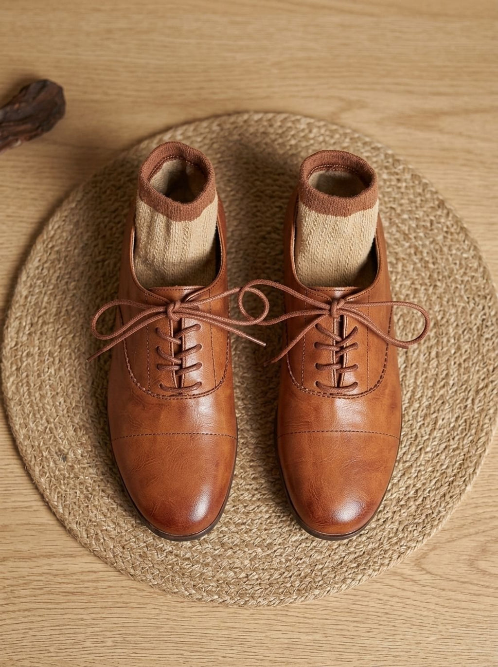 Women's brown cap toe lace-up Oxford shoes with low heels