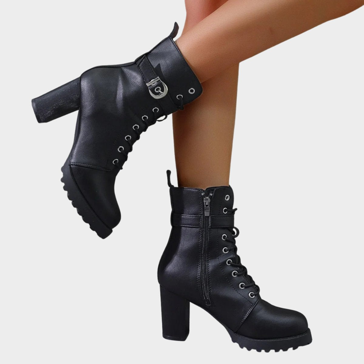 Women's lace-up ankle boots with buckle strap, high block heel and lugged sole