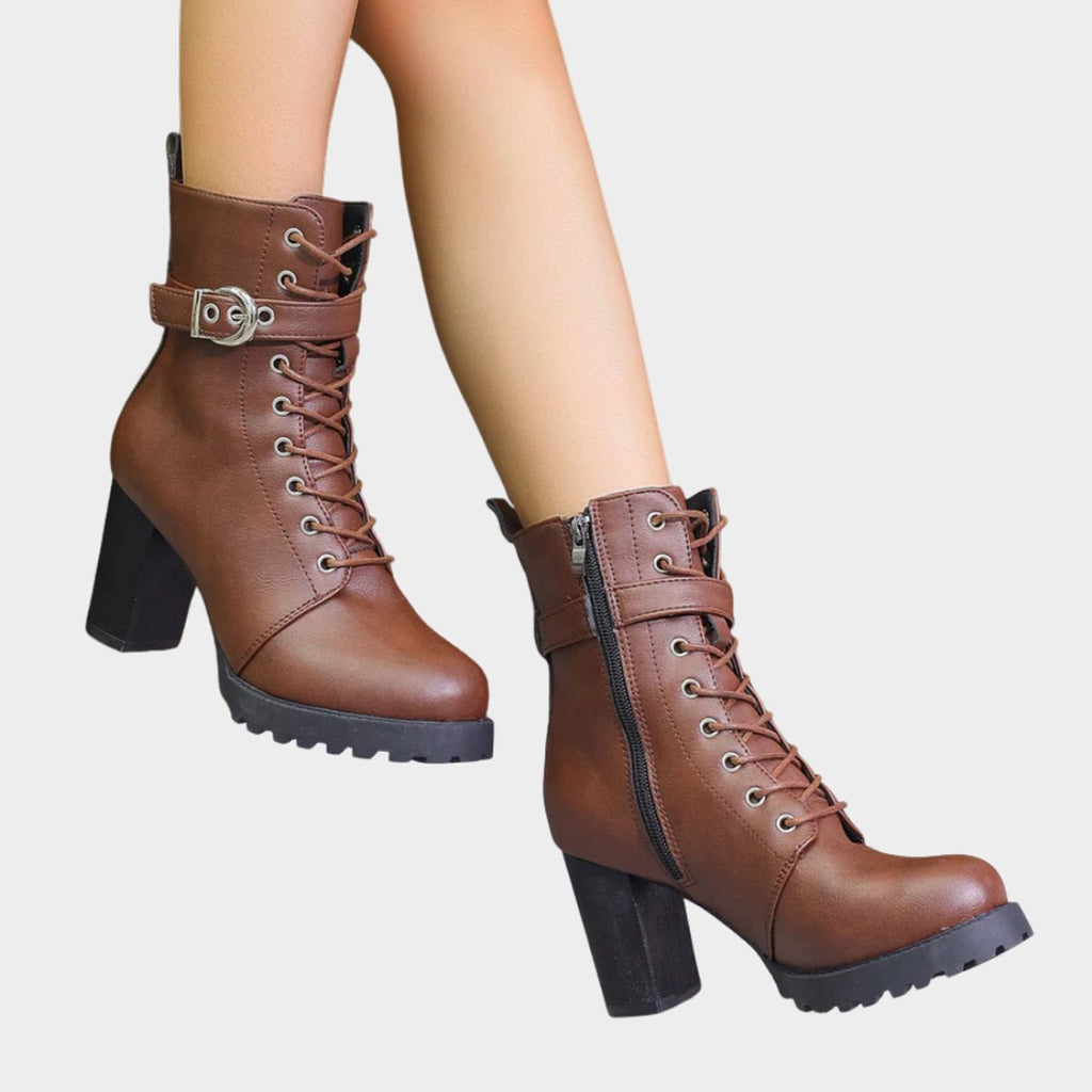 Women's lace-up ankle boots with buckle strap, high block heel and lugged sole