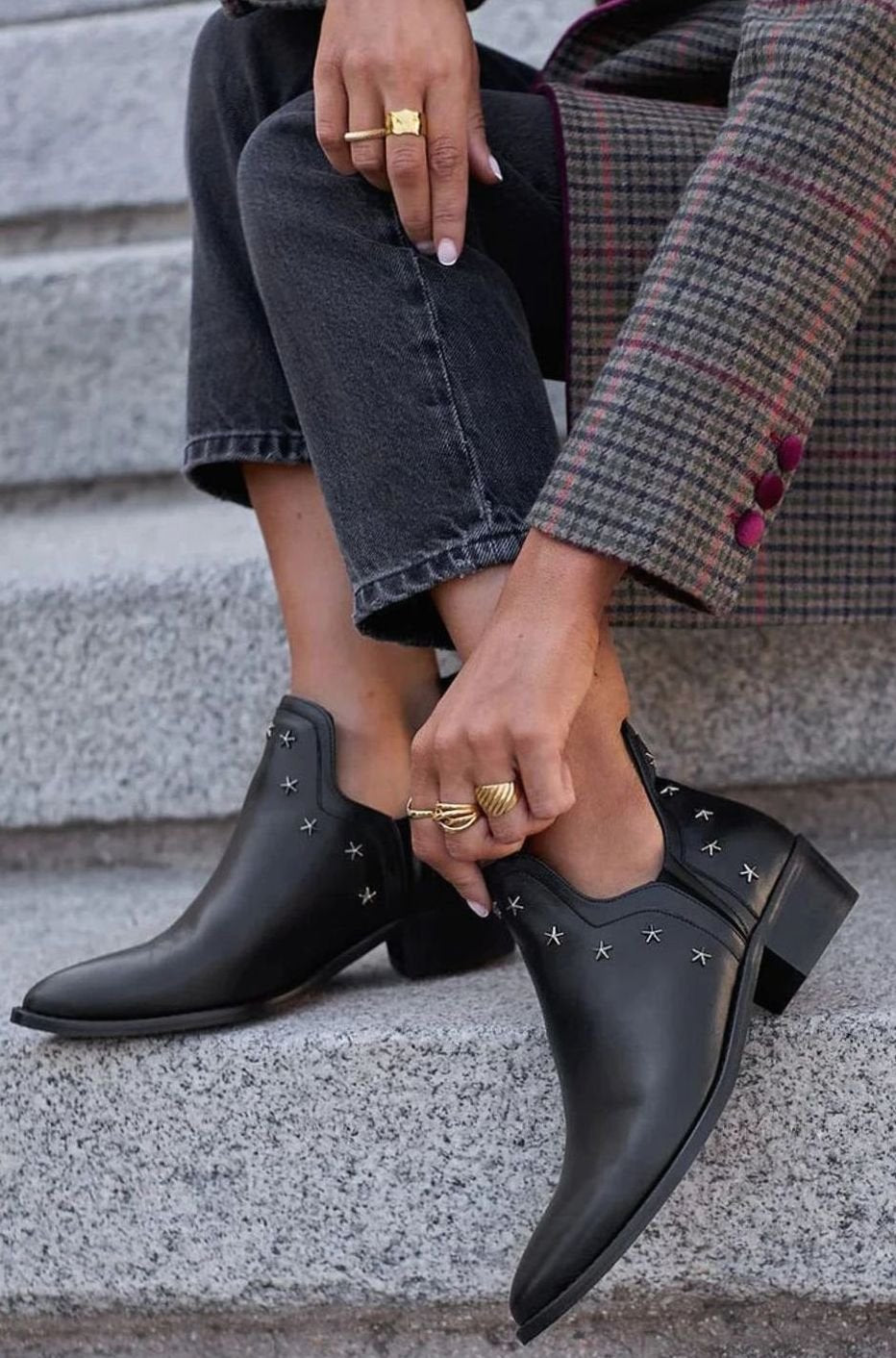 Black pointed toe ankle boots with star studs, cut-out sides and block heels