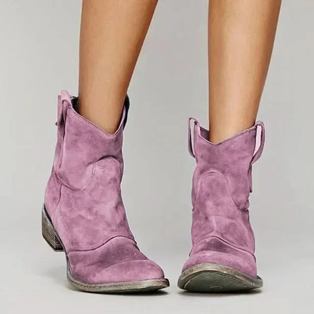 Women's vintage western ankle boots with pointed toes, pull tabs and low stacked heels