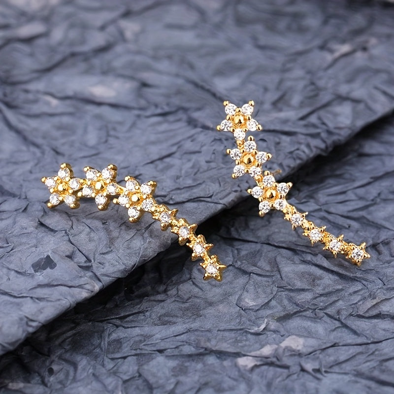 Boucles d’oreilles grimpeuses à motif floral en cristaux