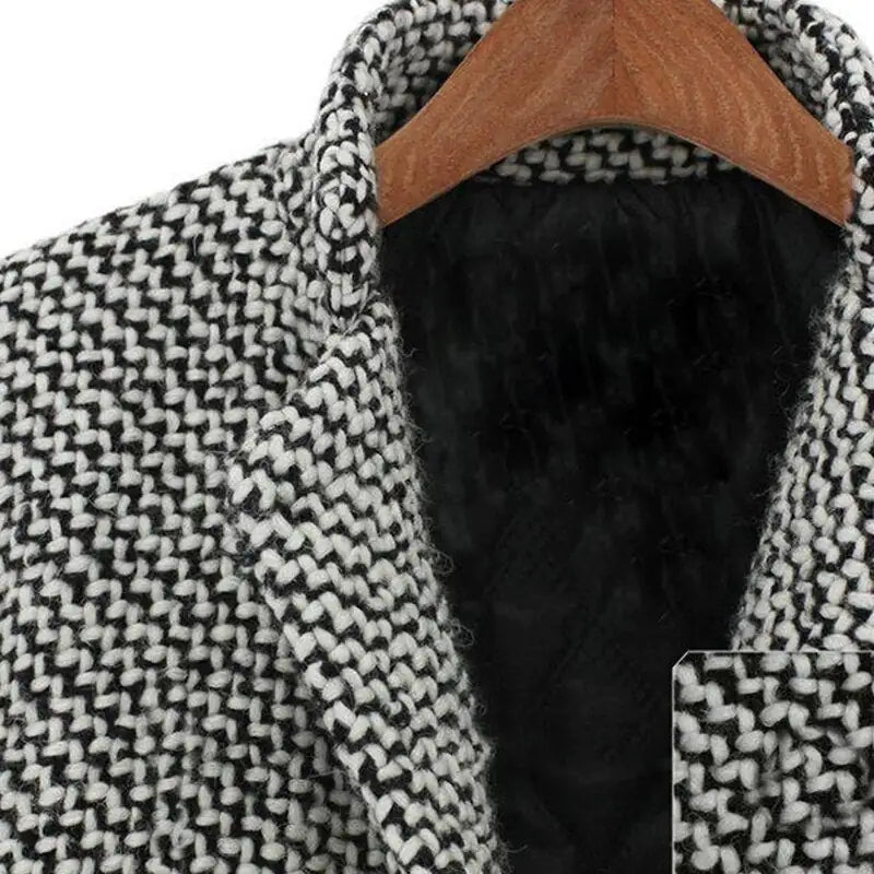 Women's black-and-white herringbone longline coat with notch lapel and long sleeves