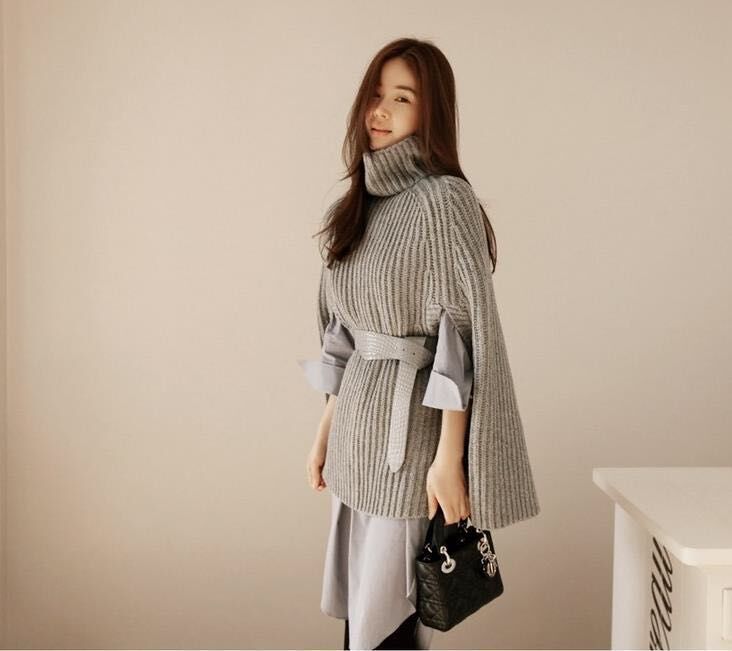 Women's ribbed knit turtleneck poncho sweater with cape sleeves