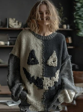 Women's color block sweater with cat motifs, distressed edges and stitched panel details