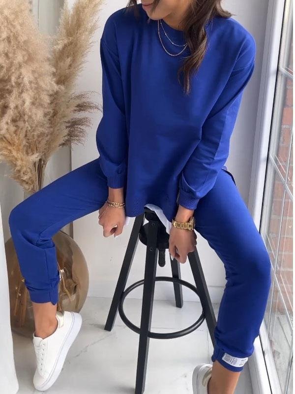Women's crew neck sweatshirt and tapered jogger set with side zips and layered hem