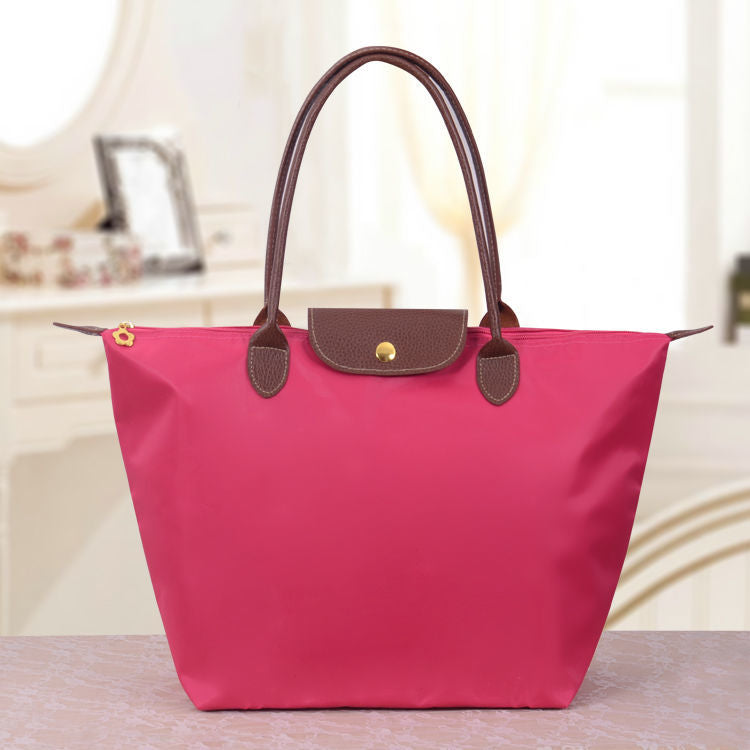 Sac cabas pliable en nylon avec bordure en cuir