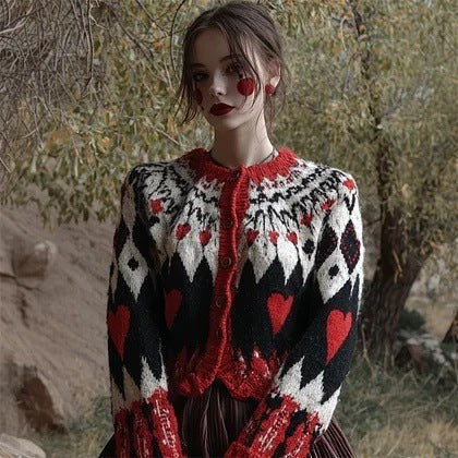 Women's color block sweater with cat motifs, distressed edges and stitched panel details