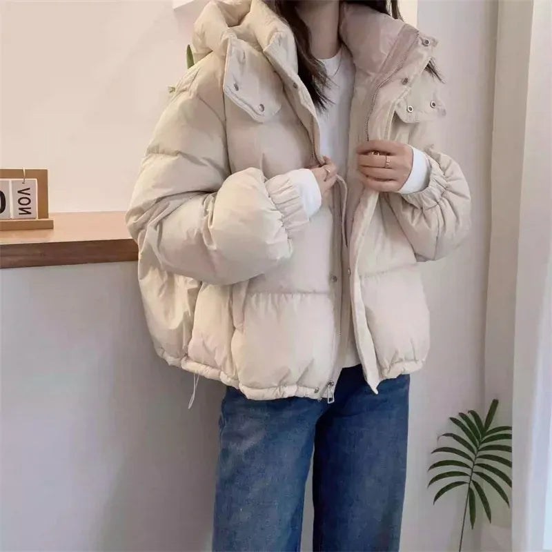 Women's cropped quilted puffer jacket with hood, long sleeves and zip front