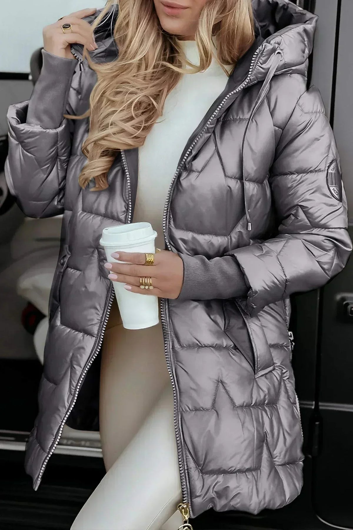 Women's hooded longline puffer jacket with glossy geometric quilting