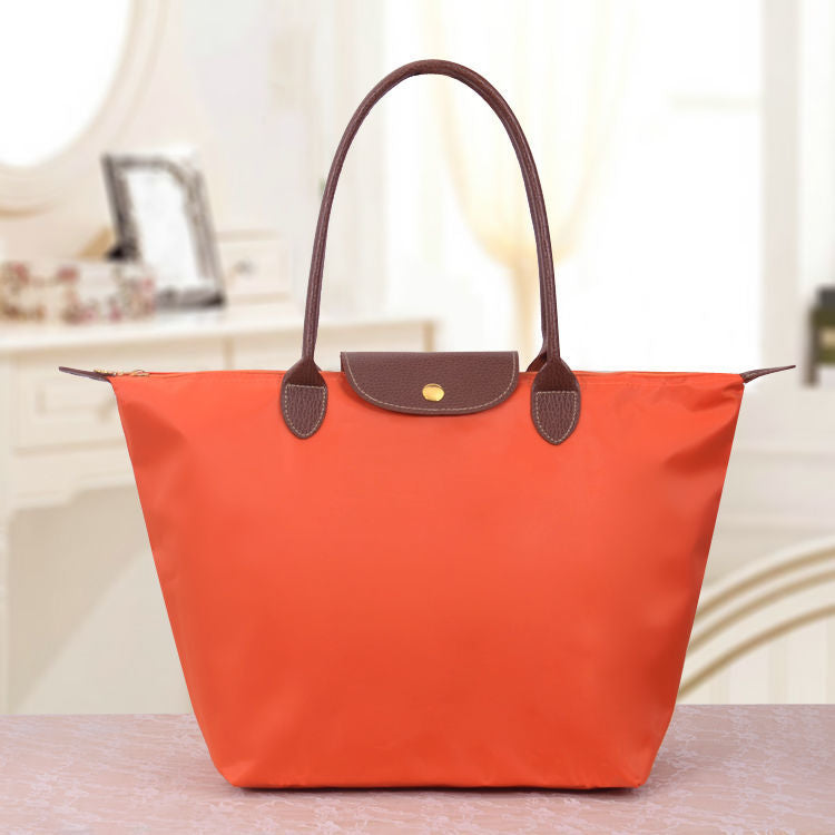 Sac cabas pliable en nylon avec bordure en cuir