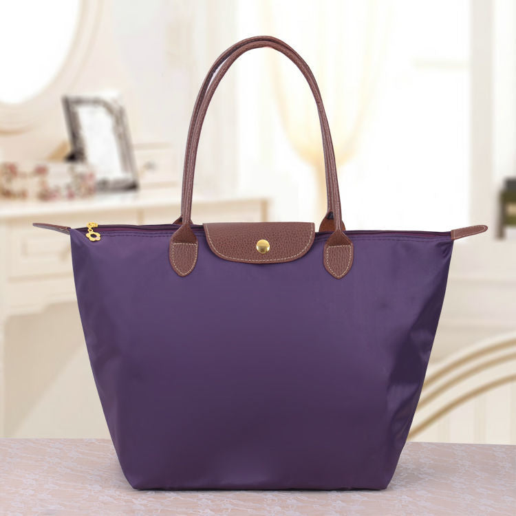 Sac cabas pliable en nylon avec bordure en cuir