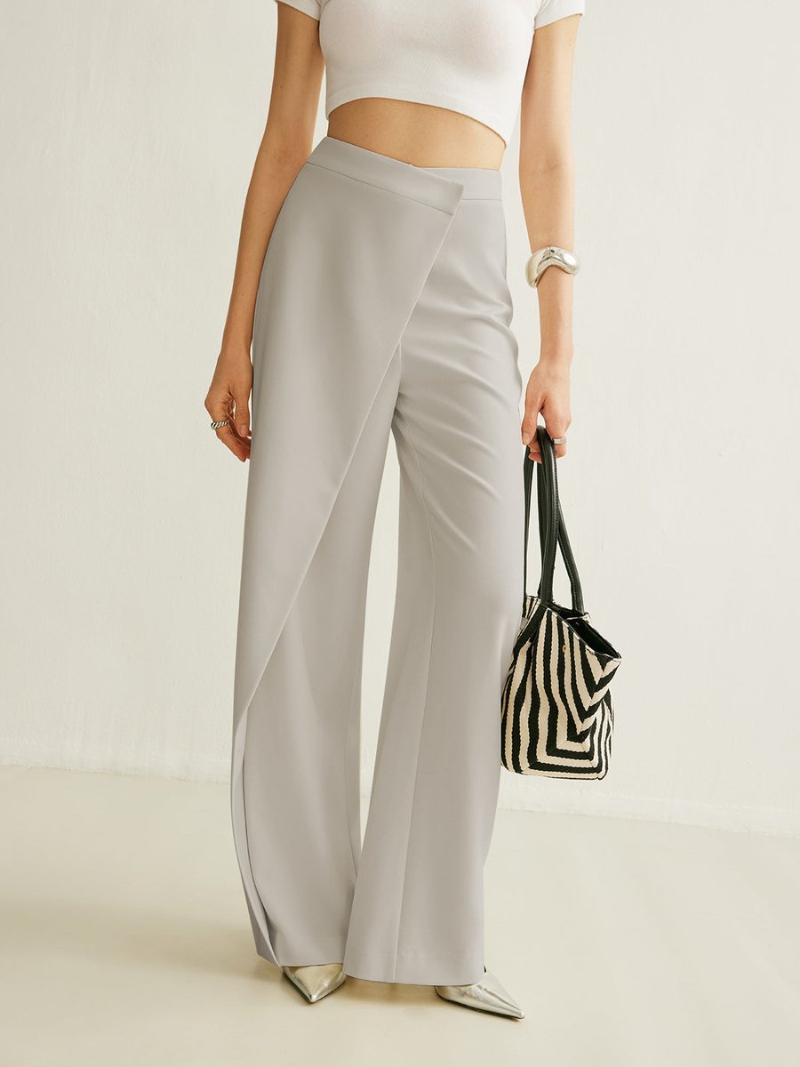Pantalon tailleur large avec empiècement portefeuille sur le devant