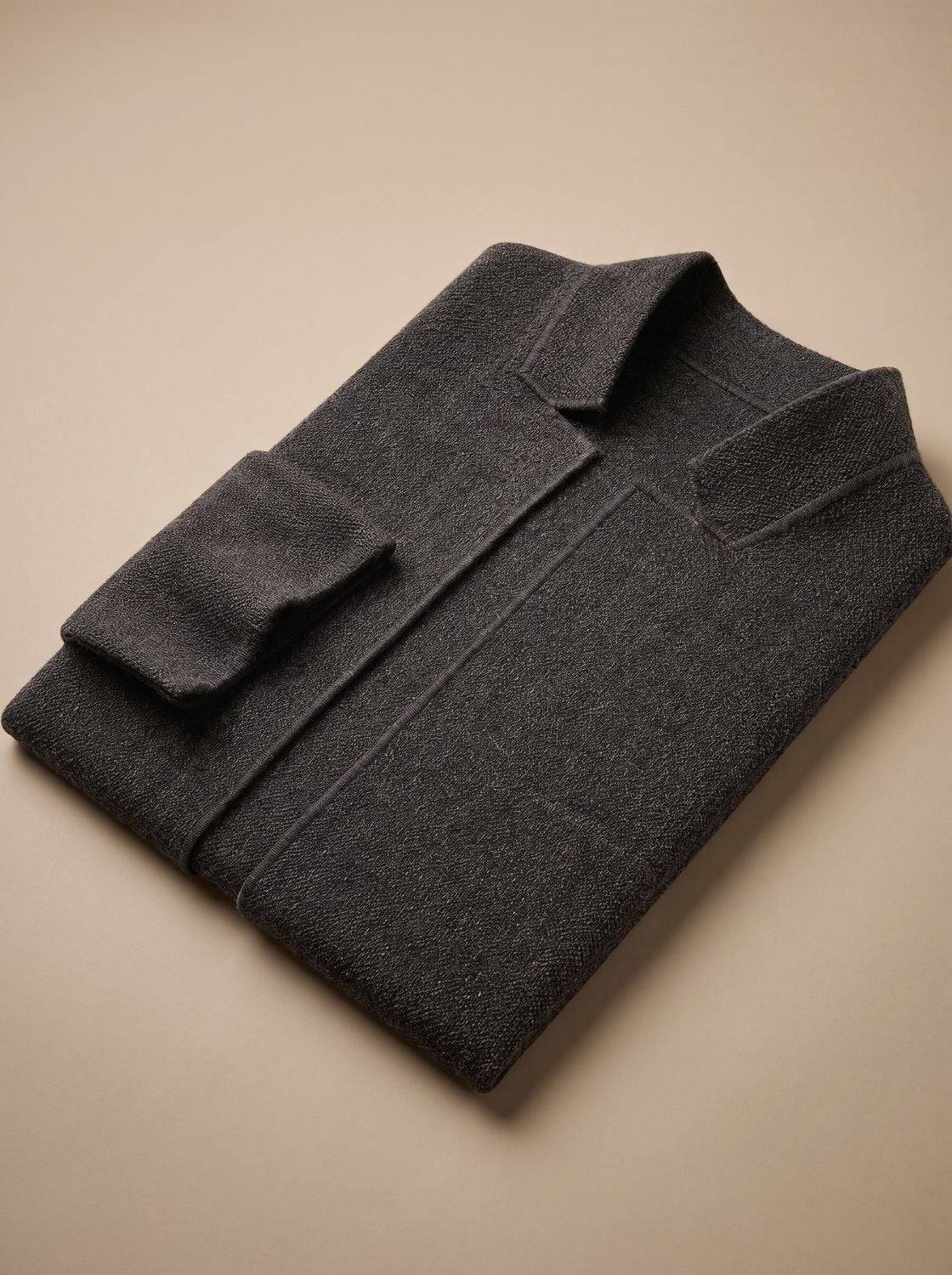 Men's textured knit blazer jacket with notch lapel, buttons and patch pockets