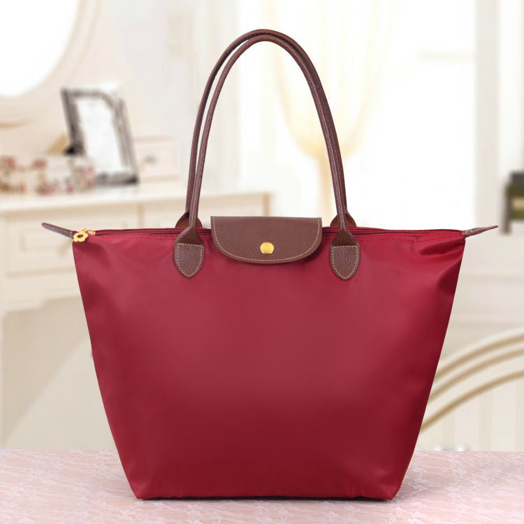 Sac cabas pliable en nylon avec bordure en cuir