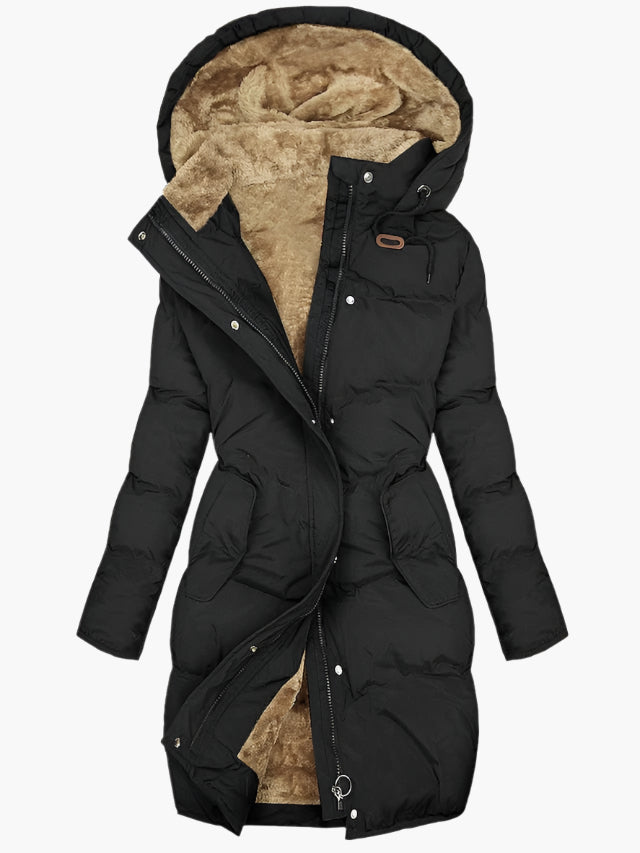 Women's hooded longline puffer coat with quilted panels and plush-lined hood