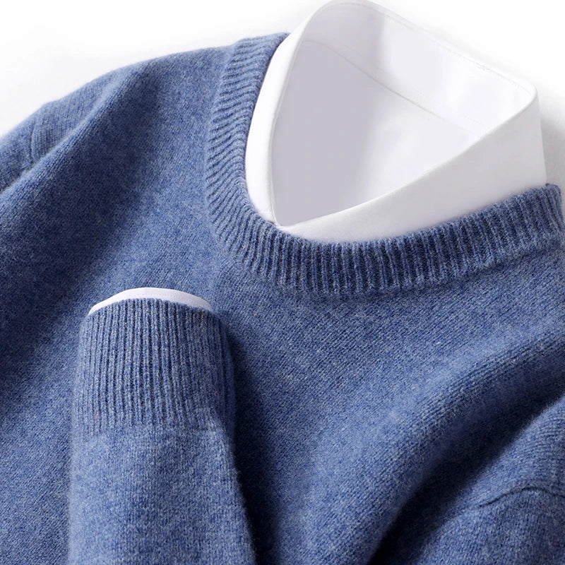Men's textured knit crew neck sweater shown in light blue and black with long sleeves and ribbed edges