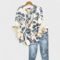 Blouse fleurie à col en V, manches à volants et coupe à étages