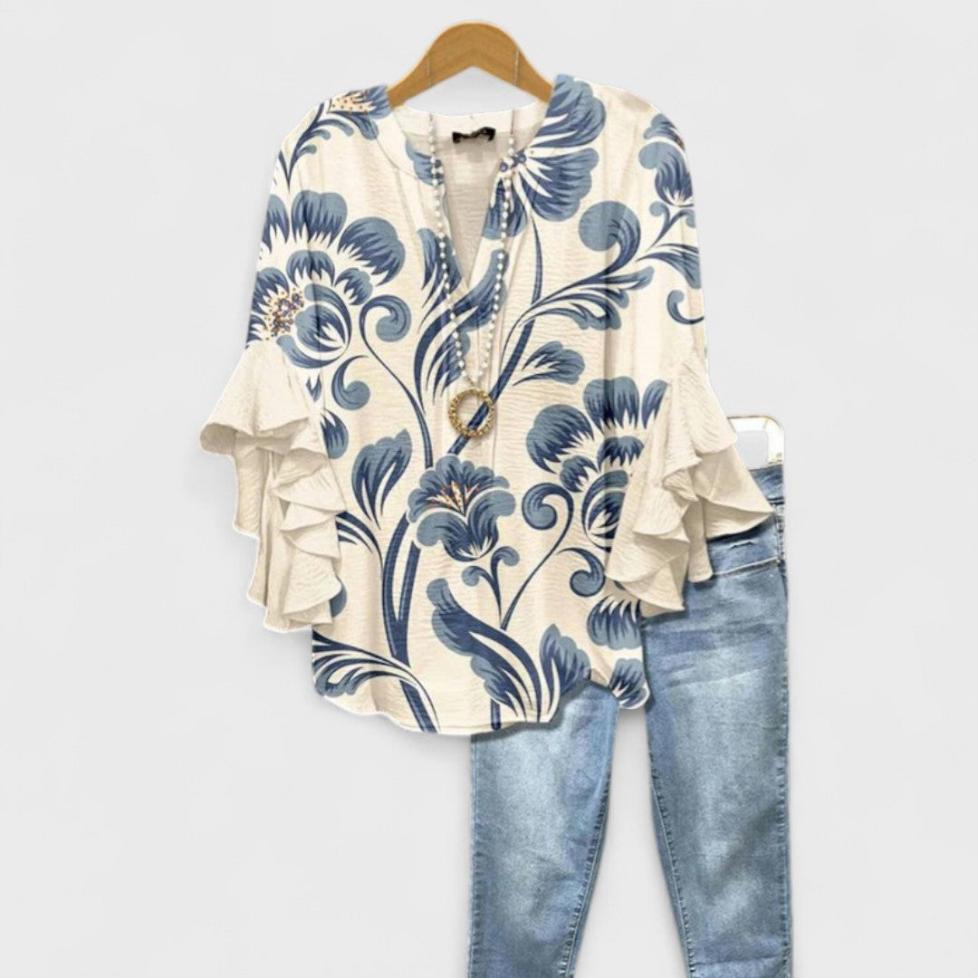 Blouse fleurie à col en V, manches à volants et coupe à étages
