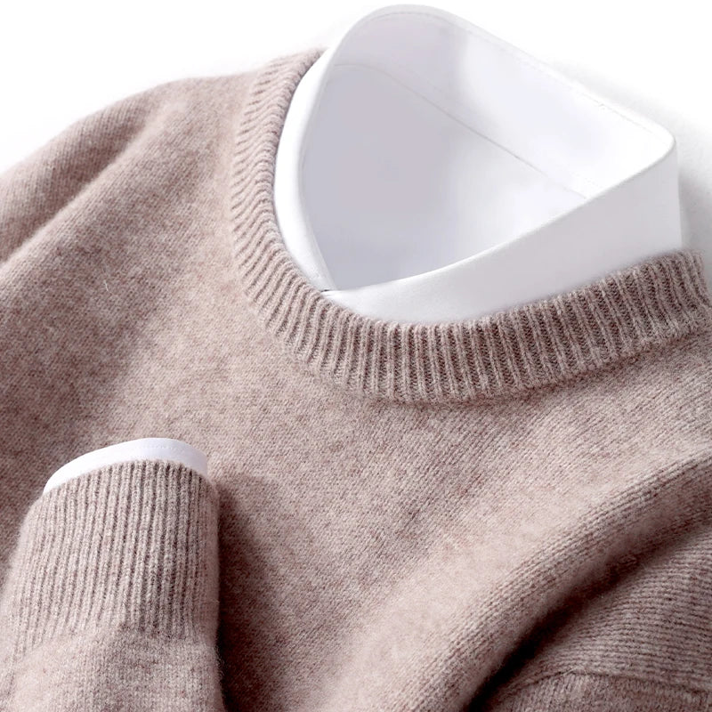 Men's textured knit crew neck sweater shown in light blue and black with long sleeves and ribbed edges