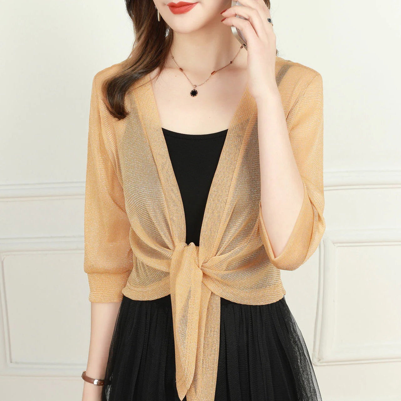 Cardigan court transparent en mousseline, noué sur le devant