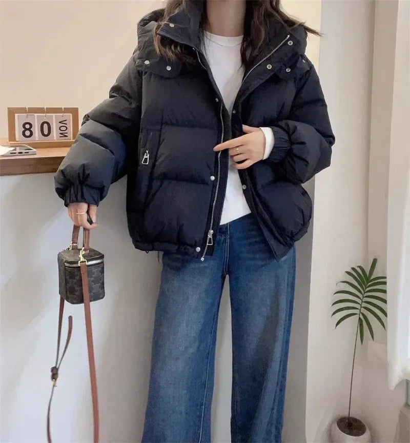 Women's cropped quilted puffer jacket with hood, long sleeves and zip front