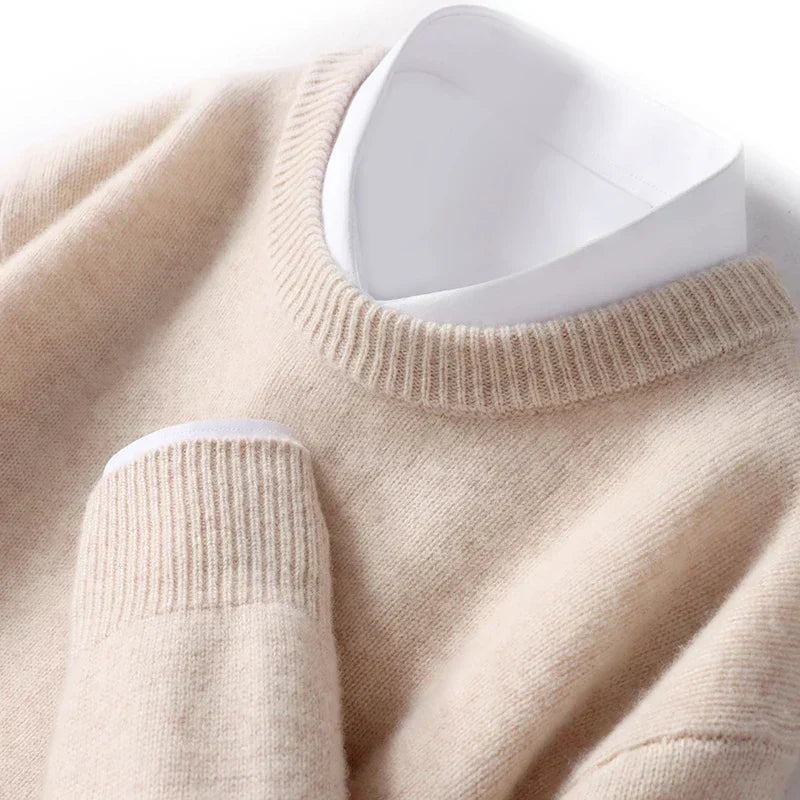 Men's textured knit crew neck sweater shown in light blue and black with long sleeves and ribbed edges