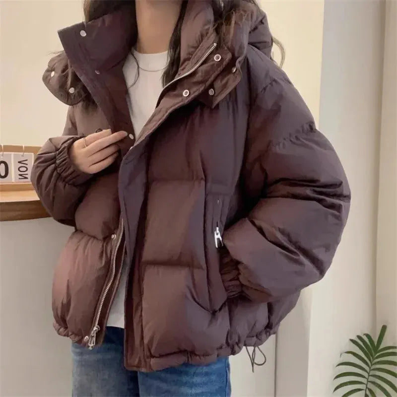 Women's cropped quilted puffer jacket with hood, long sleeves and zip front