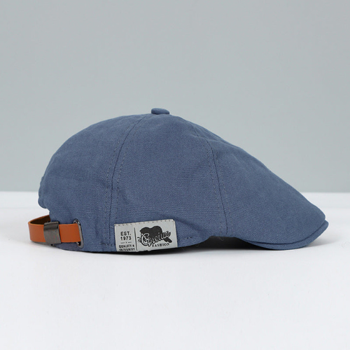 Casquette plate gavroche en coton avec bride en cuir réglable