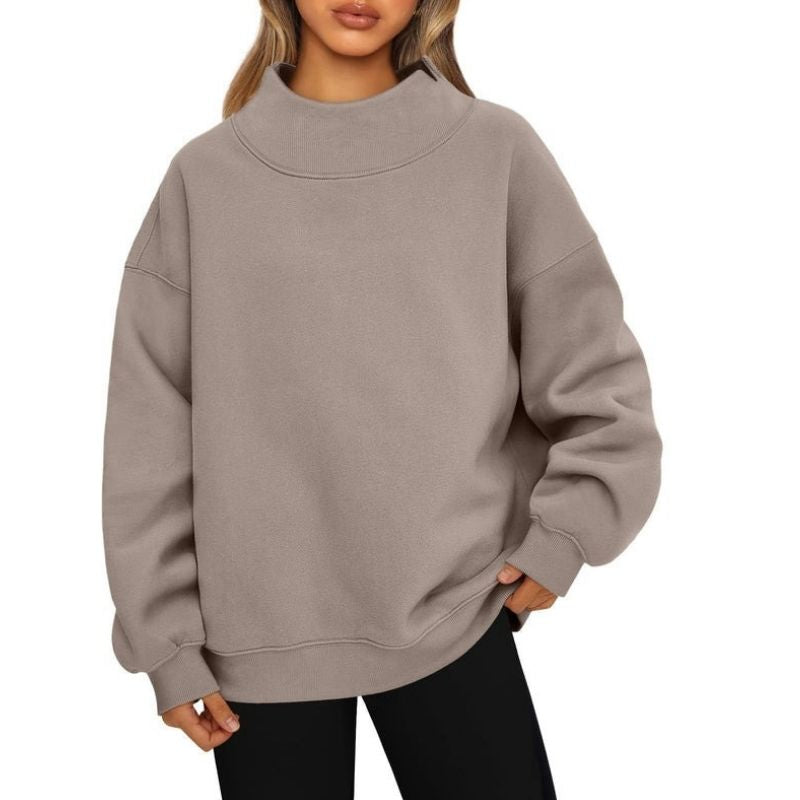 Women's oversized mock neck sweatshirt with long sleeves and ribbed trim