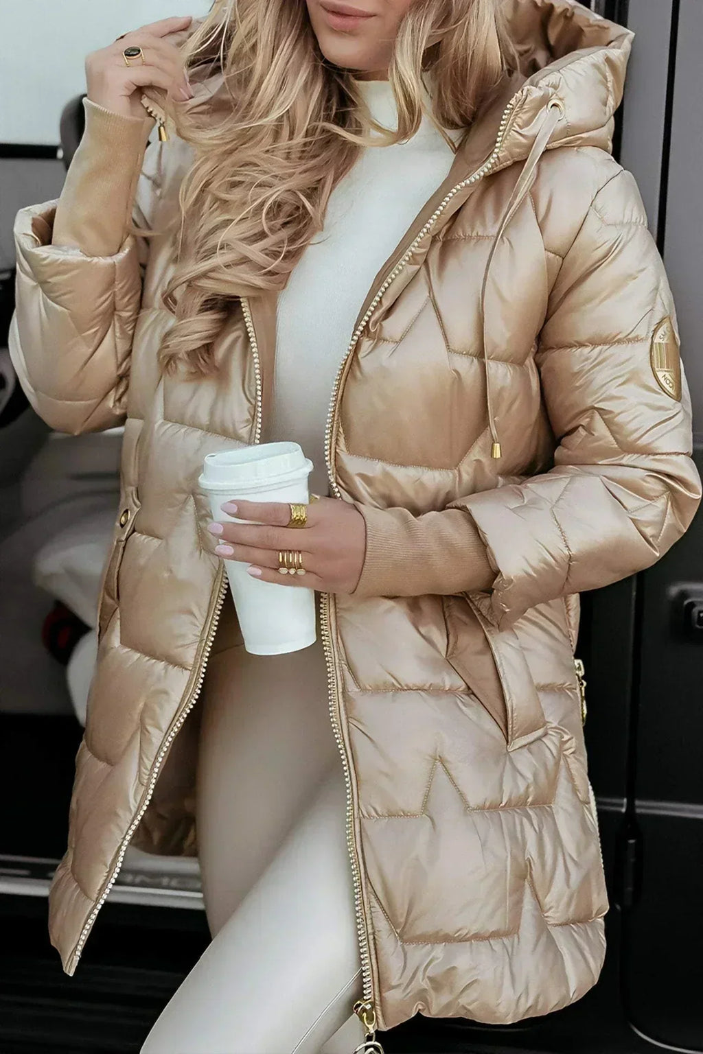 Women's hooded longline puffer jacket with glossy geometric quilting