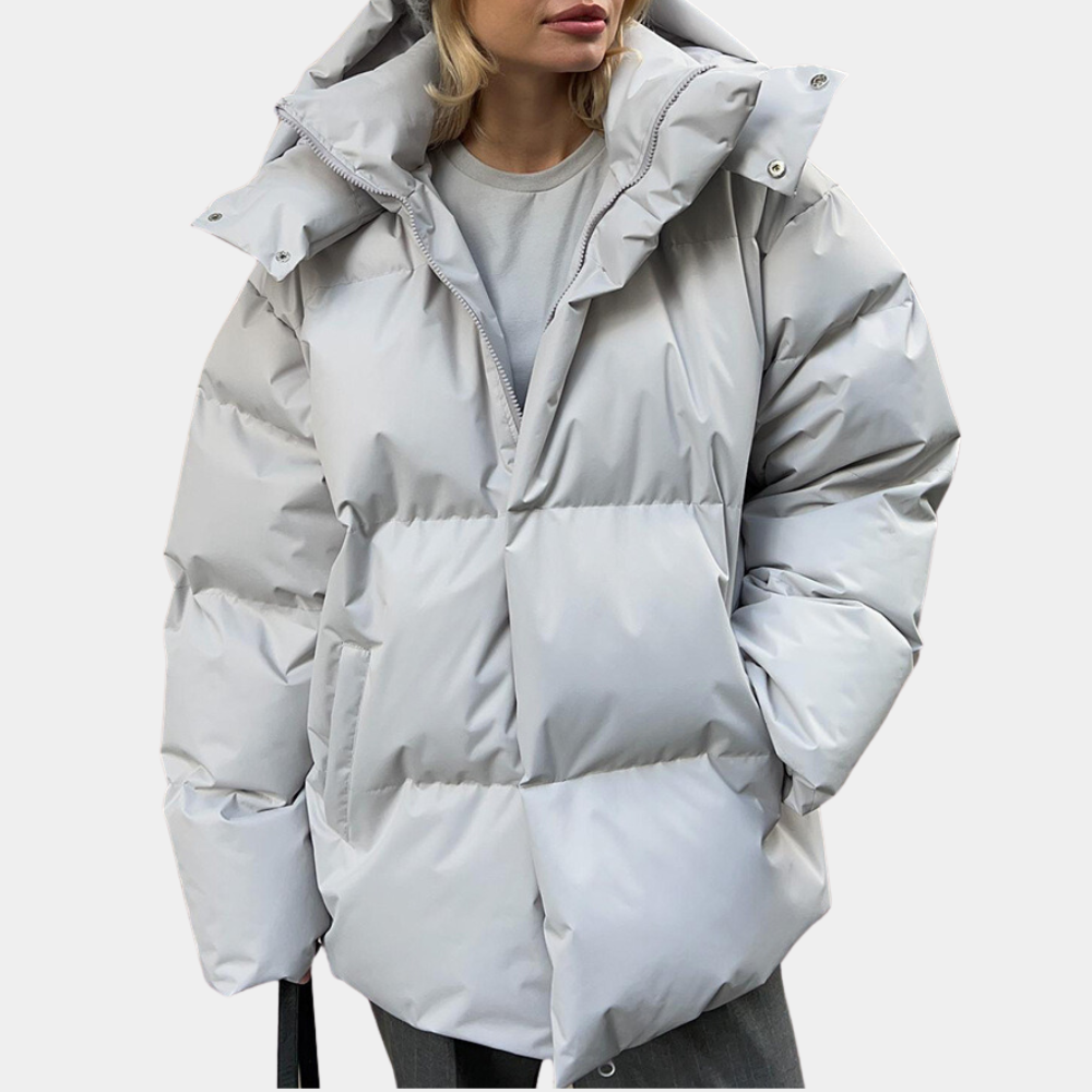 Women's oversized quilted puffer jacket with hooded collar and zip front