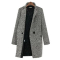 Women's black-and-white herringbone longline coat with notch lapel and long sleeves