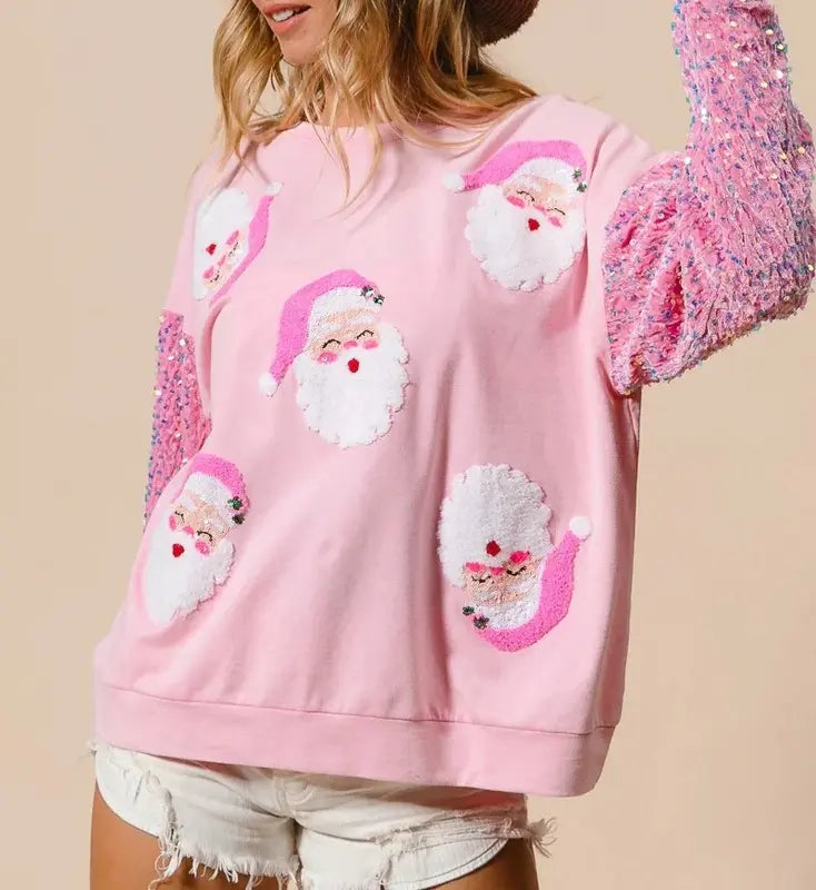 Women's pink Christmas sweatshirt with Santa motifs and sequin sleeves