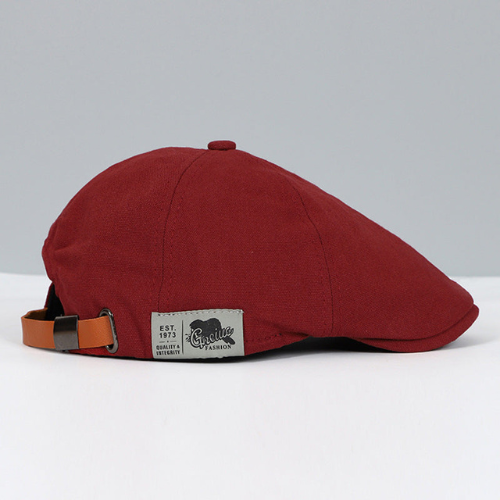 Casquette plate gavroche en coton avec bride en cuir réglable