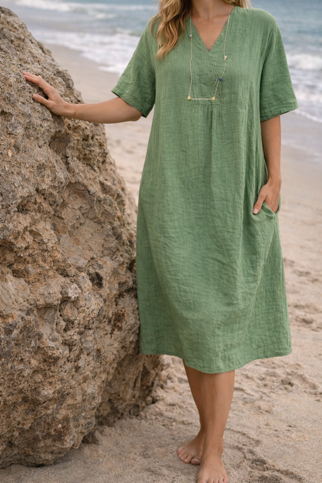 Robe midi en lin avec détail boutonné et poches latérales