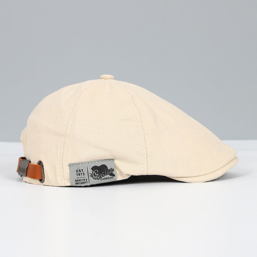 Casquette plate gavroche en coton avec bride en cuir réglable