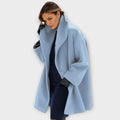 Women's open front coat with wide lapels and long sleeves