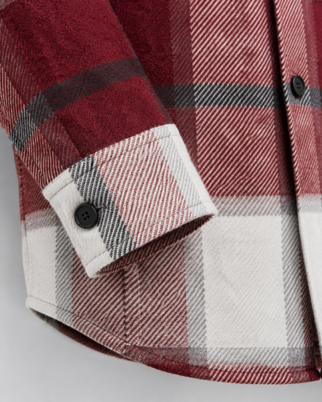Men's plaid button-up overshirt with long sleeves and two chest patch pockets
