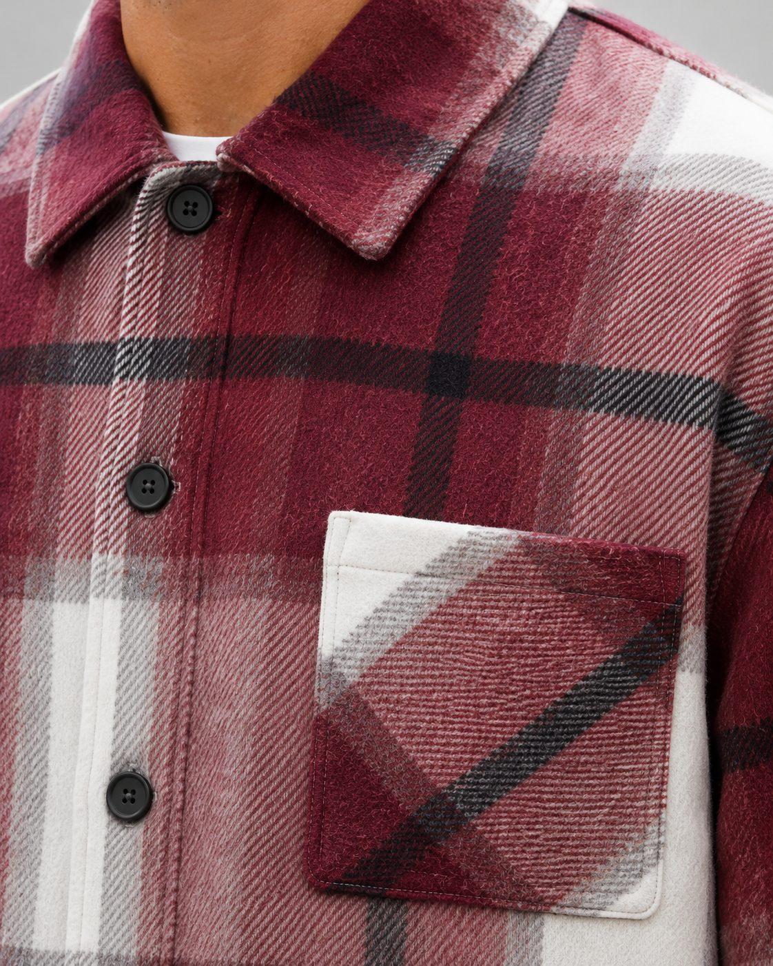 Men's plaid button-up overshirt with long sleeves and two chest patch pockets