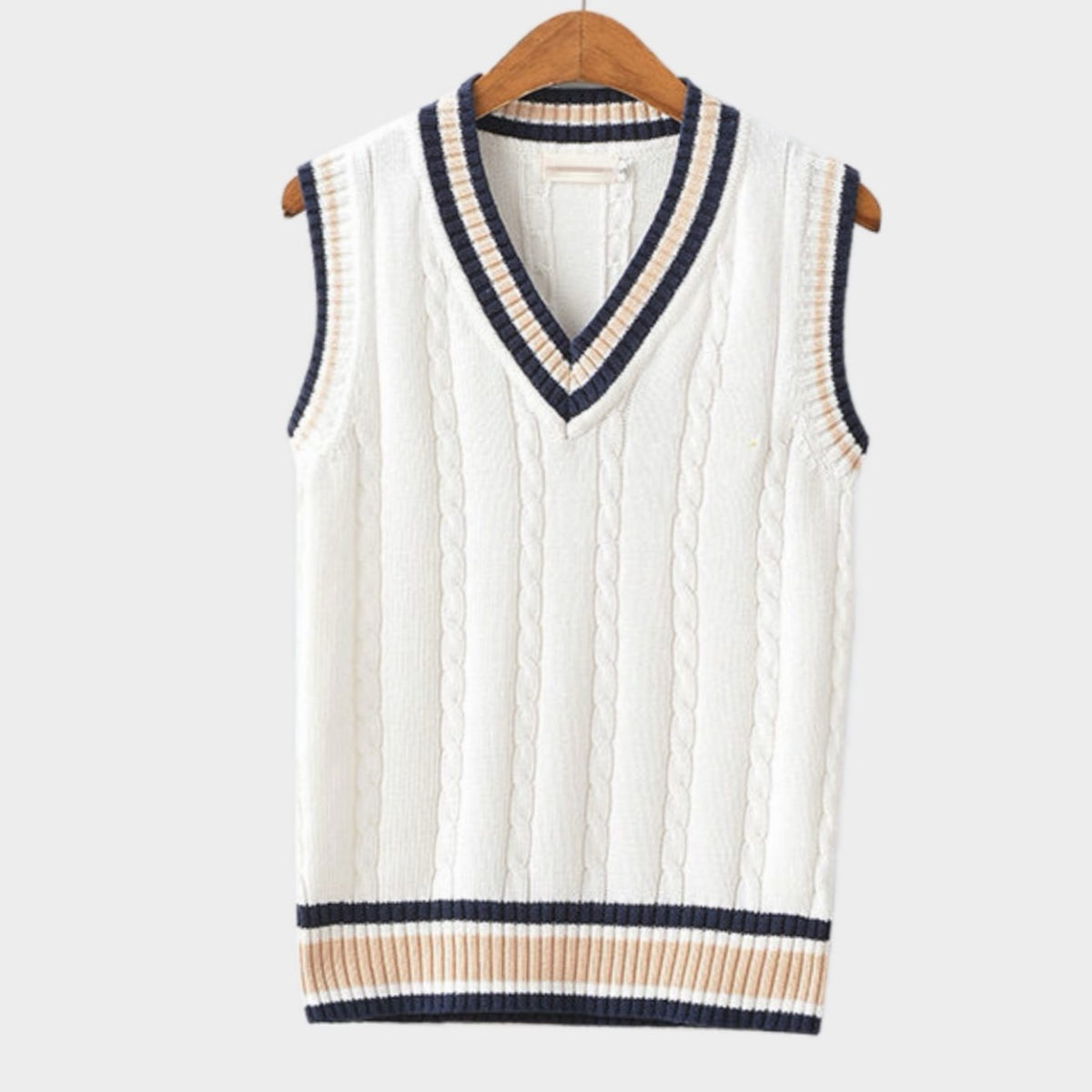 Women's striped cable-knit sweater vest with V-neck and contrast trim