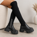 Women's over-the-knee ribbed boots with side zippers and chunky platform lug soles