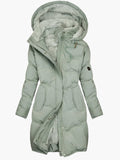 Women's hooded longline puffer coat with quilted panels and plush-lined hood