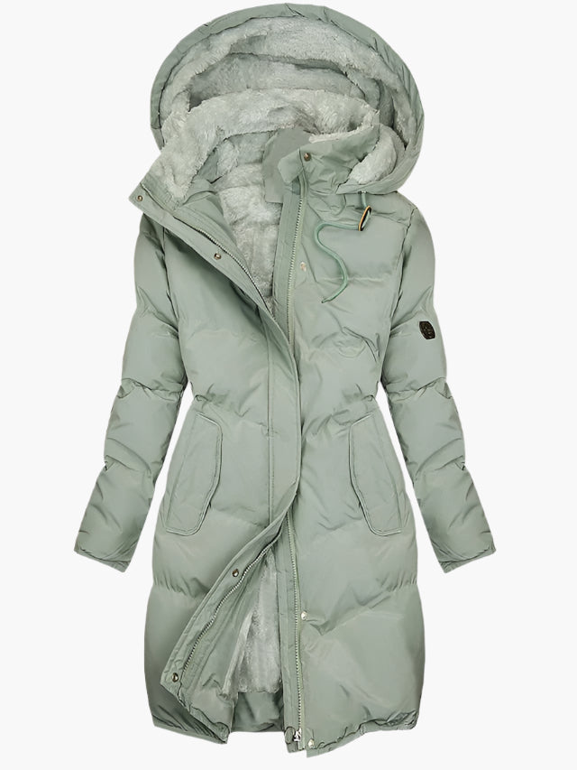 Women's hooded longline puffer coat with quilted panels and plush-lined hood