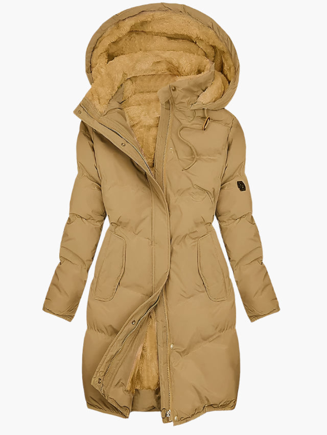 Women's hooded longline puffer coat with quilted panels and plush-lined hood