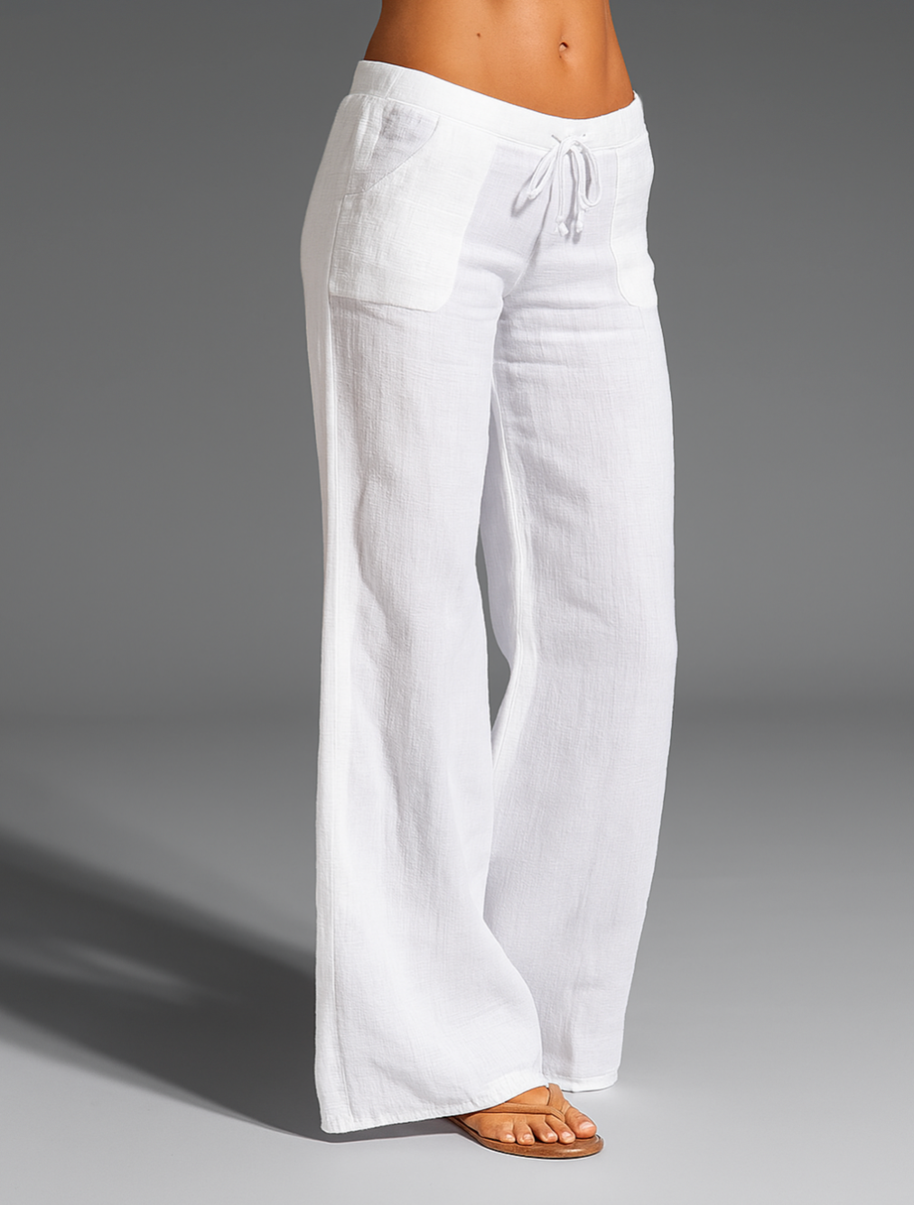 Pantalon ample en lin pour femme, coupe décontractée et jambes larges, avec taille à cordon de serrage