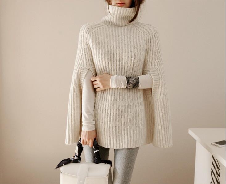 Women's ribbed knit turtleneck poncho sweater with cape sleeves