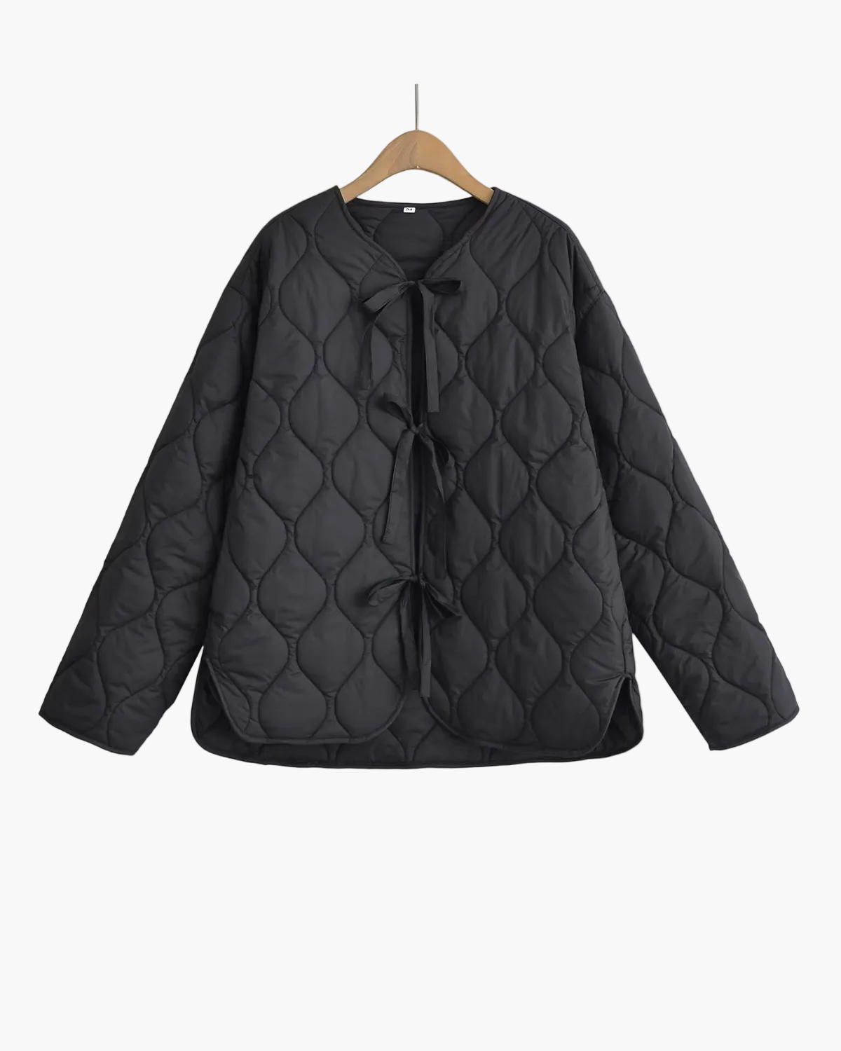 Women's quilted tie front jacket with diamond quilting and long sleeves